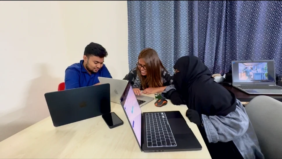 LozicLabs teammates working in the office